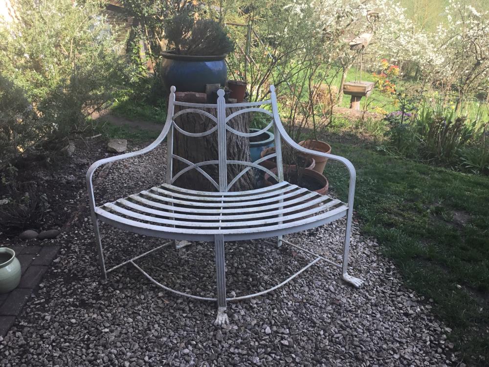 Curved metal bench before refurbishment.