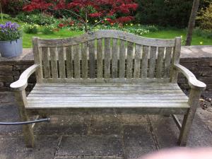 Wooden bench before refurbishment.