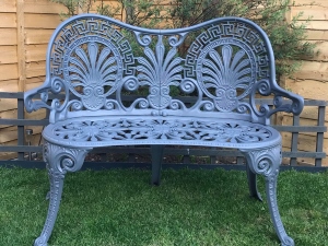Garden metal bench after refurbishment.